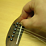 Cách thay dây đàn Guitar Accoustic